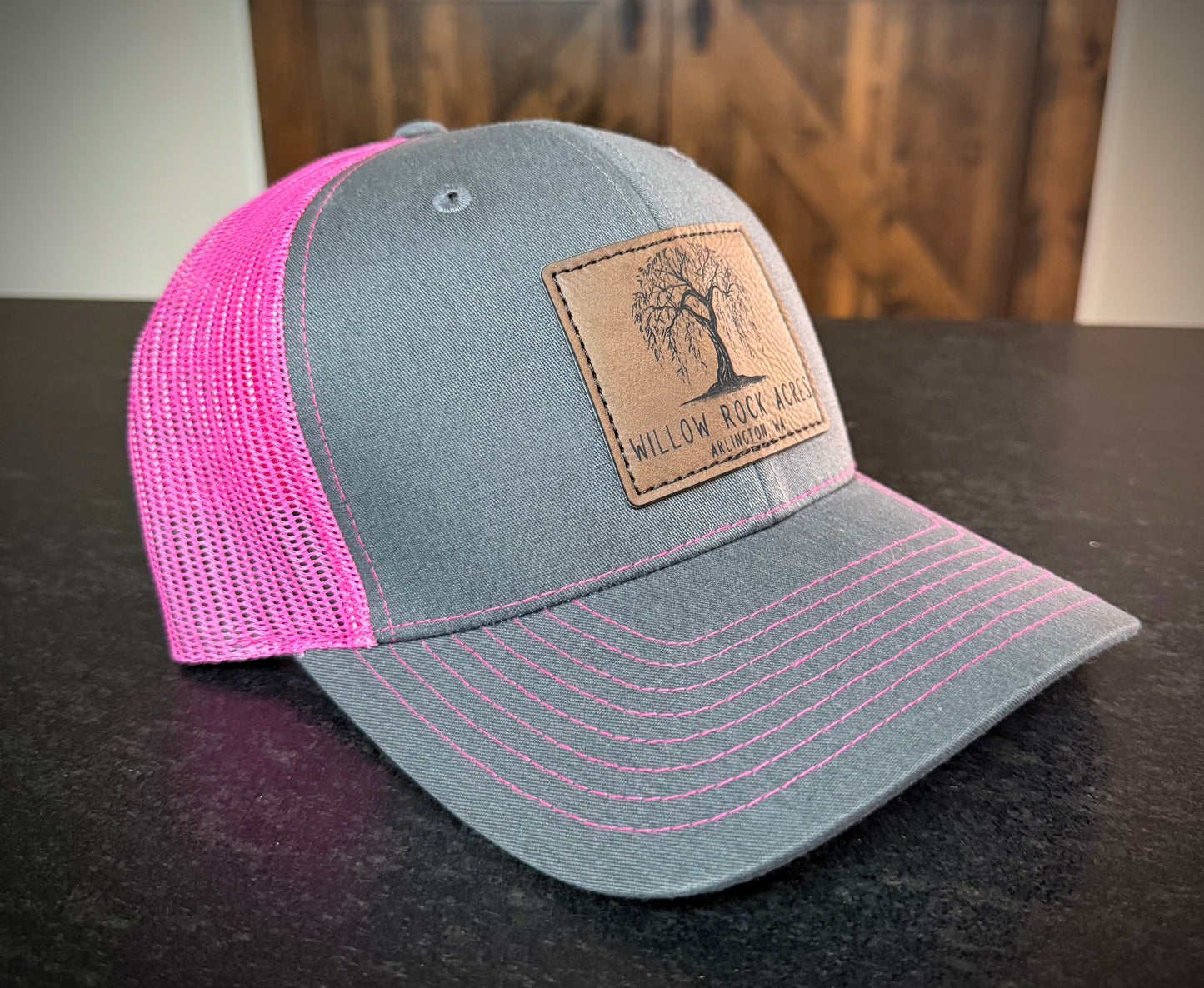 Richardson 112 trucker hat in Charcoal/Neon Pink