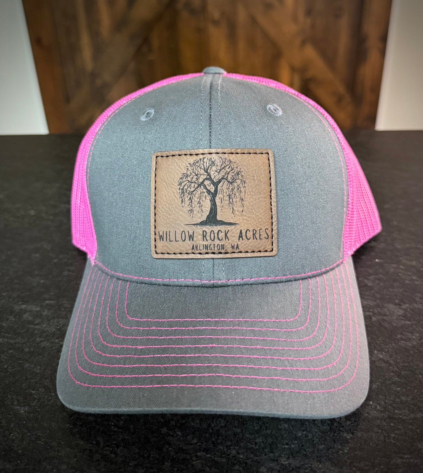 Richardson 112 trucker hat in Charcoal/Neon Pink